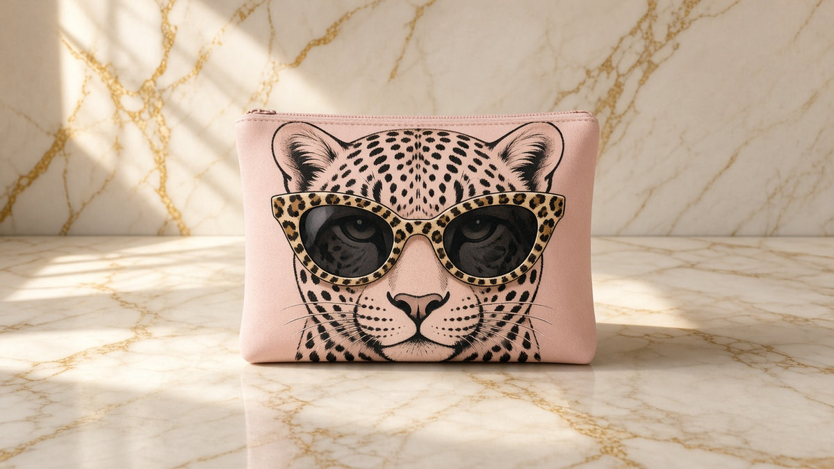 Cool Cat Leopard Zipper Pouch on cream marble with gold veining
