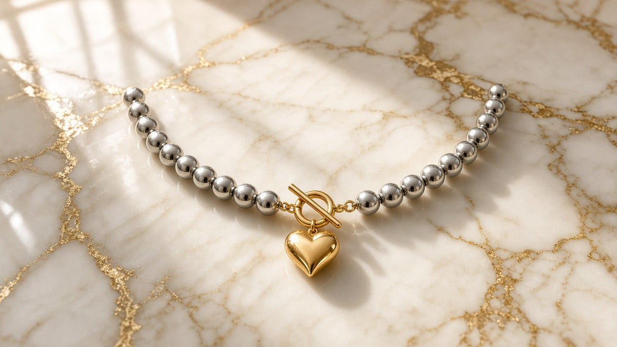Heart Pendant Necklace on cream marble with gold veining