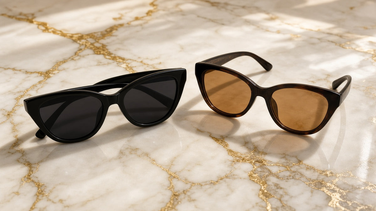 Riviera Cat-Eye Sunglasses on cream marble with gold veining