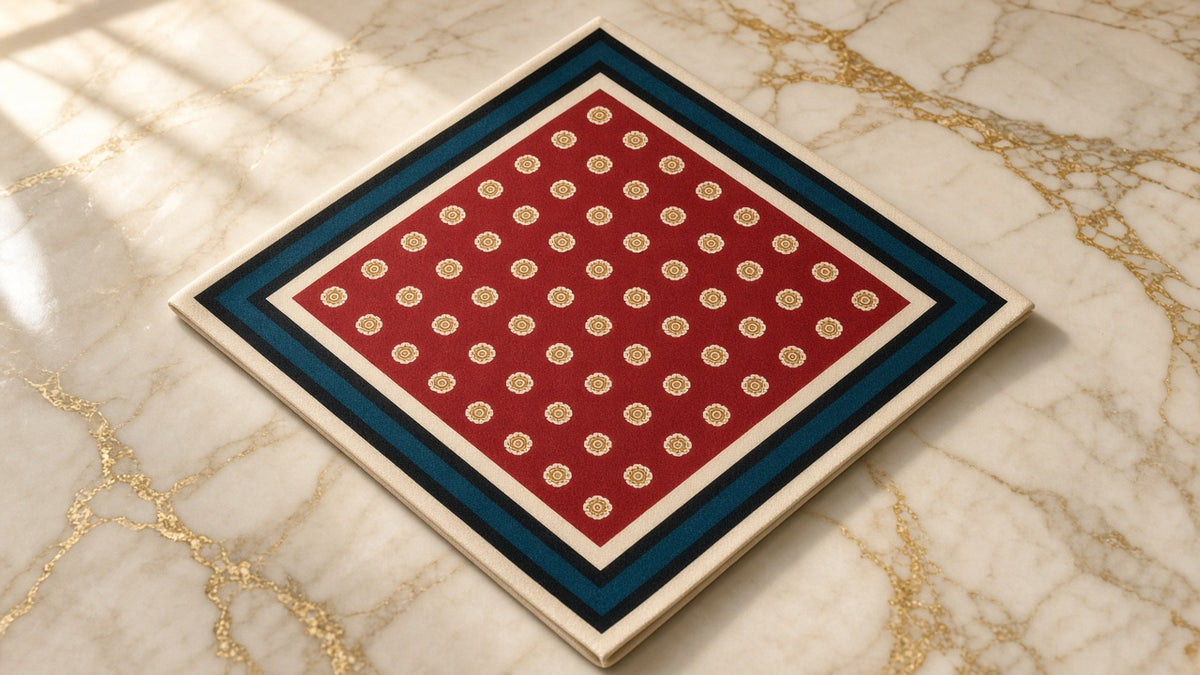 Rust Revival Triangle Scarf on cream marble with gold veining