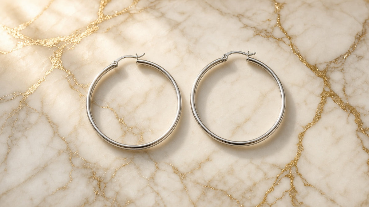 Silver Halo Large Hoop Earrings on cream marble with gold veining