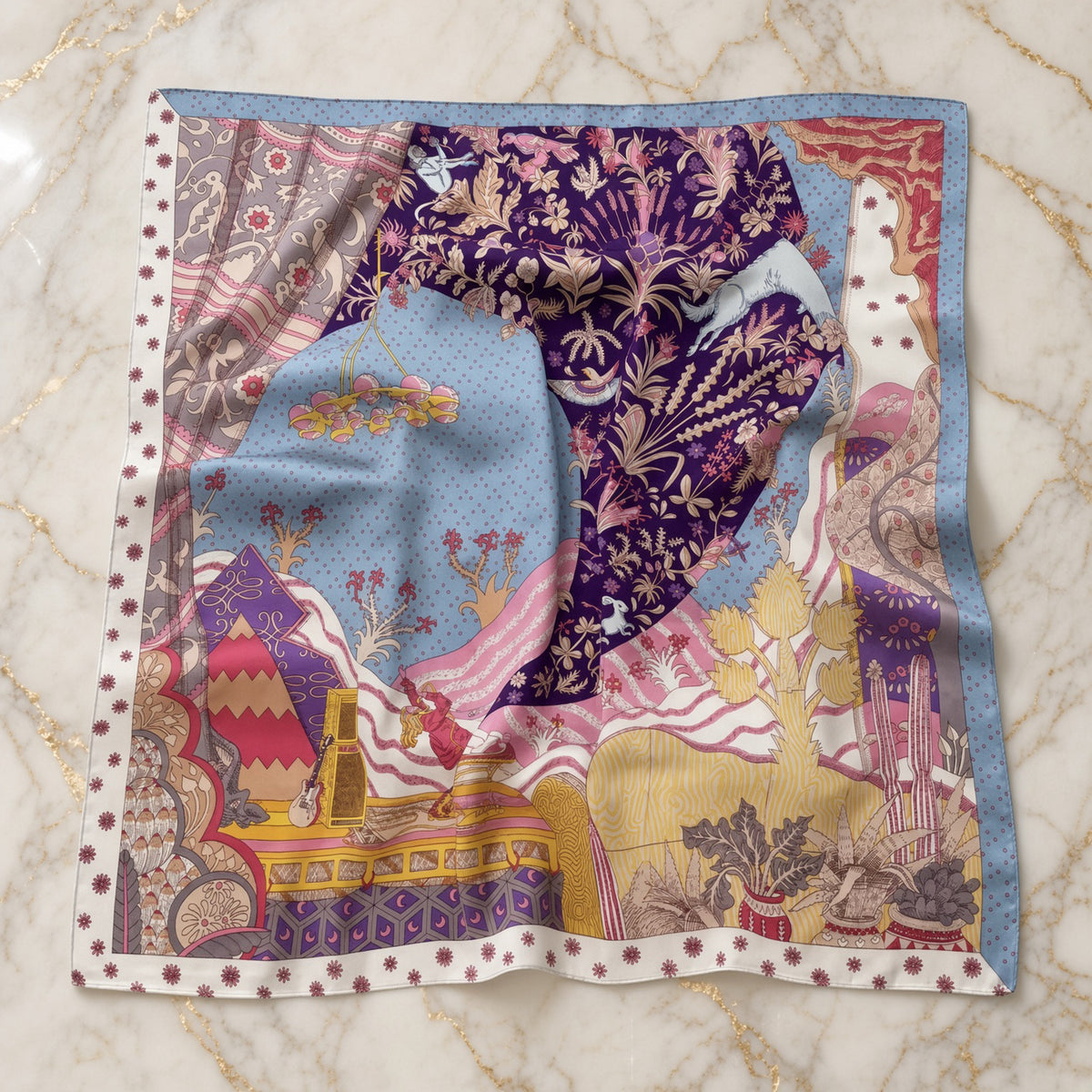 Violet Field scarf laid flat showing garden, hare, and dotted border on marble